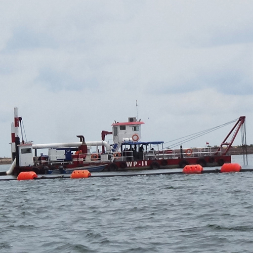 Dredger performing river desilting