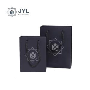 China Moistureproof Shopping Bag With Ribbon Handle SA8000 Paperboard wholesale
