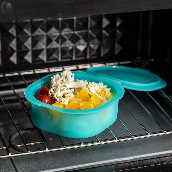 Silicone container with food inside, demonstrating portion size