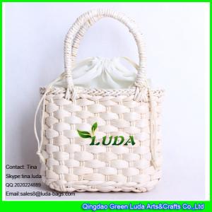 China LDYP-026 drawstring closure straw handbag natural kdis handbag handmade straw basket bag wholesale