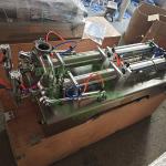 Pneumatic Double Head Manual Filling Mineral Water Bottling Machine