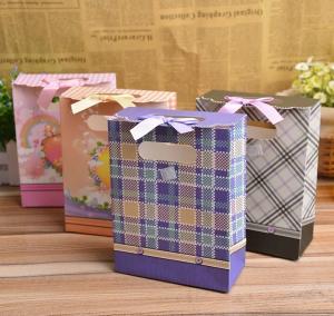 China Custom Luxury Gift Garment Paper Shopping Bags With Logo Print wholesale