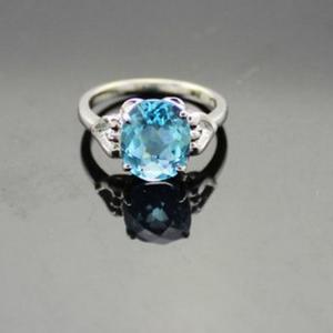 China 925 Silver Jewelry 8mmx10mm Round Blue Topaz Cubic Zircon Ring (R248) wholesale