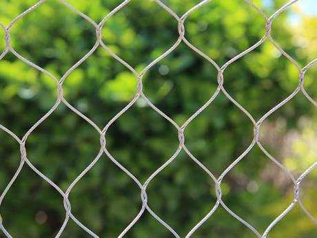 There is a sample of interwoven gibbon enclosure mesh.