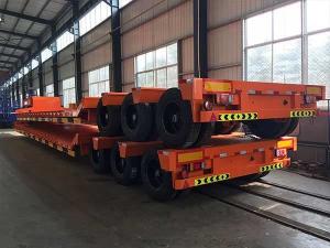 China 3 Axles Semi Lowbed Trailer 60000kg Semi Truck Flatbed Trailer wholesale