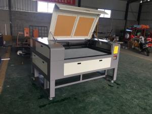 China dual laser head laser head laser cutting machine 1390 wholesale
