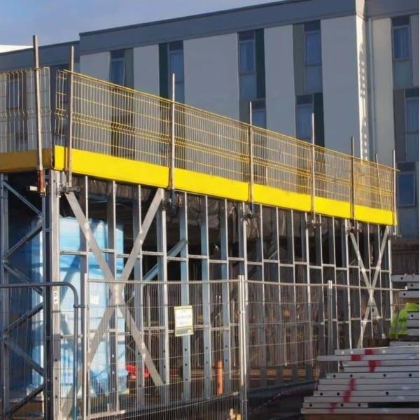 Low-Profile Edge Protection Barrier Minimal Obstruction Maintains Workspace