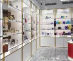 Golden Luxury Cosmetic Display Cabinet 4 Layers With Acctrative Advertising
