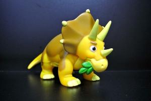 China 6 Inch Yellow Dinosaur Collectible Vinyl Toys 80 - 90 Degree For Kids Play wholesale