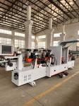 Automatic door pocket slotting machine