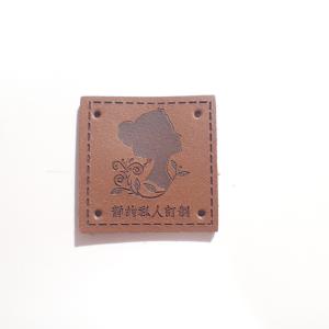 China Debossed Logo Small PU Leather Patches suitable For Hat And Bag wholesale