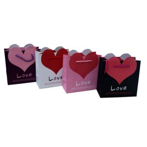 China Love heart shape paper carrier bags with matt coat 230gsm artpaper 2 color printing wholesale