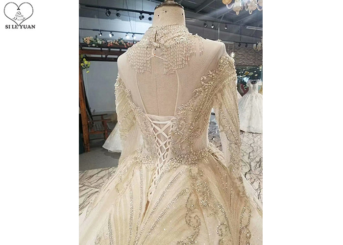 High Neck Ivory Ball Gown Wedding Dress Backless Long Sleeve Gold Beading