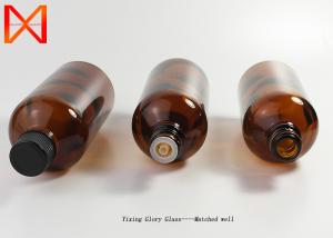 China Round Brown Essential Oil Bottles Modern Stylish Precious For Beauty Cosmetics wholesale