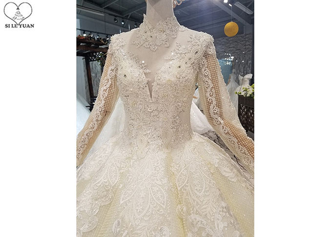 Ivory Long Sleeve High Neck Bridal Gowns Backless Sweep Train Special Beaded Net