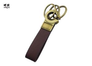 China Antique Bronze Metal Leather Strap Keychain , 42g Personalised Leather Key Fob wholesale
