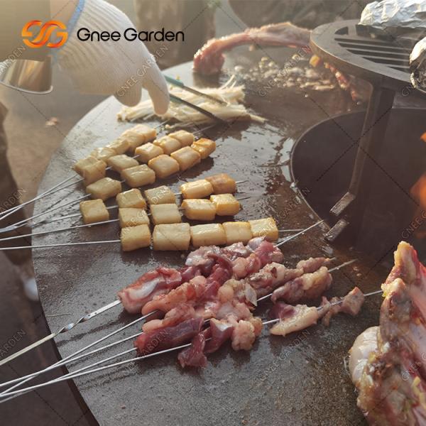 Wood Burning Corten Steel Outdoor BBQ Table Fire Pit Barbecue Grill Charcoal Bbq Working Staff