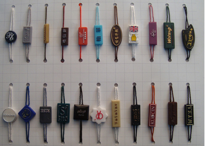 Custom Swing Tags Plastic Tag Hangers Plastic Product Hang Tags Holders Suppliers