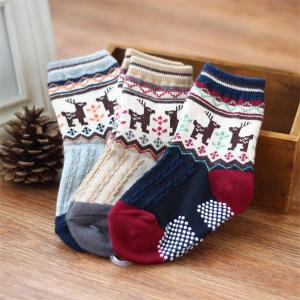 China Novelty customized cartoon christmas deer design cozy cotton terry socks for baby wholesale
