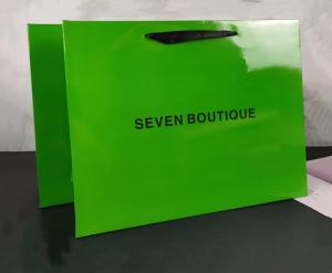 China Gold Logo 26x9x33cm Avocado Green Apparel Paper Bag With Ribbon Handle wholesale