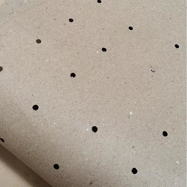 100gsm Cutting Bed Punching Perforated Kraft Paper With Round Hole Recycled Pulp Style