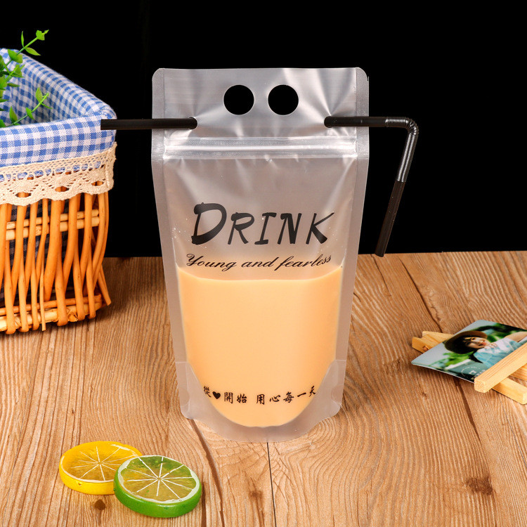 Custom clear transparent reusable and disposable plastic stand up drinking fruit juice packing pouch bag with straw