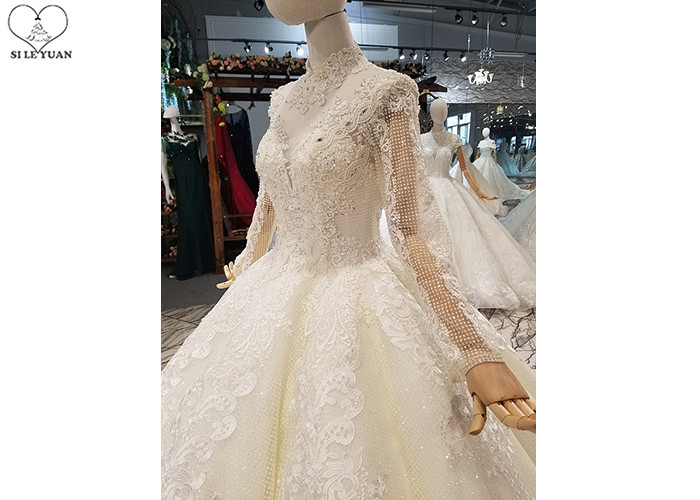 Ivory Long Sleeve High Neck Bridal Gowns Backless Sweep Train Special Beaded Net