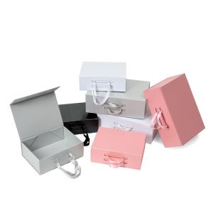 China CMYK Printing Collapsible Paperboard Magnetic Gift Box With Silk Ribbon wholesale