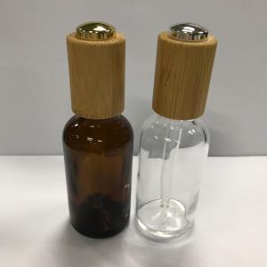 China Glass Dropper Bottles ,30ml Amber Essential Oil Bottle With Wooden Collar Skin Care Bottle OEM wholesale