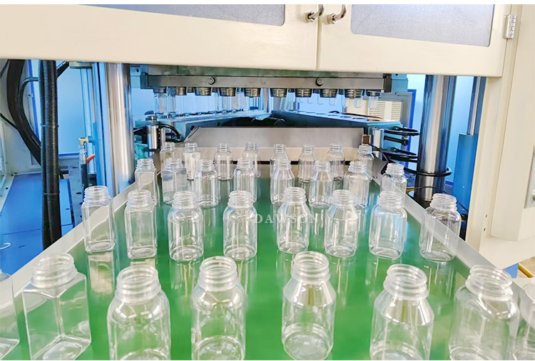 Automatic Plastic Cosmetic Bottle Making Machine Stretch Blow Moulding Machine