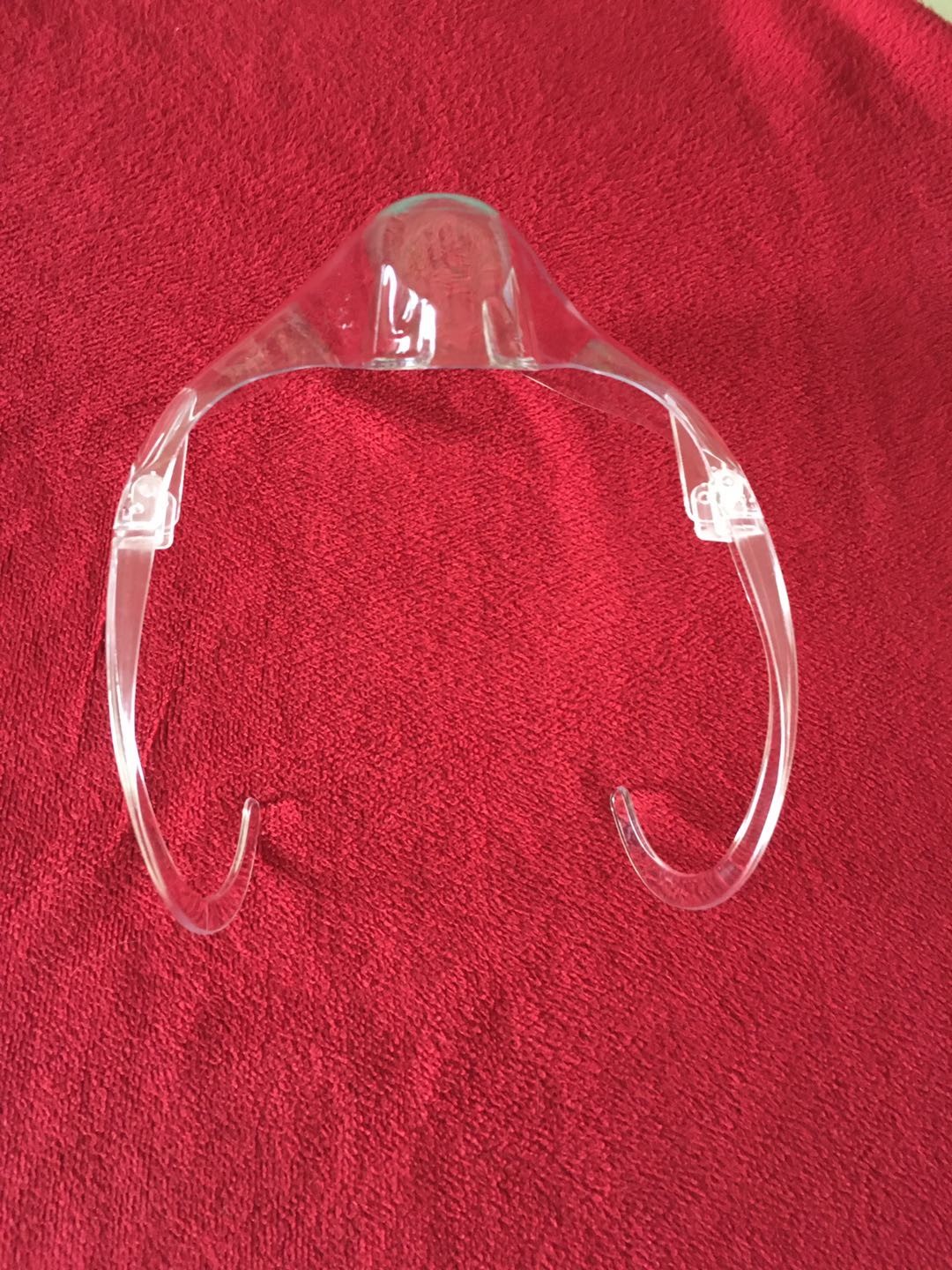 reusable anti-fog face shield or face cover with transparent cover or clear shield with visible expression