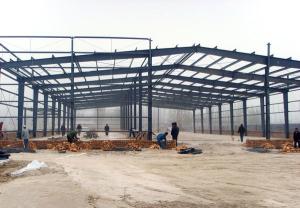 China Low cost steel structure warehouses with middle column design wholesale