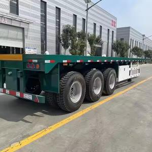 China 40ft 45ft Flat Bed Trailer Another Fuel tank Installed on the Container Flatbed Trailer Bulk Goods Transport Trailer wholesale