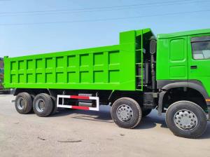 China Used Sinotruck HOWO 6*4 Dump Truck Green Large-Heavy Duty Truck Engine Capacity 6-8L wholesale