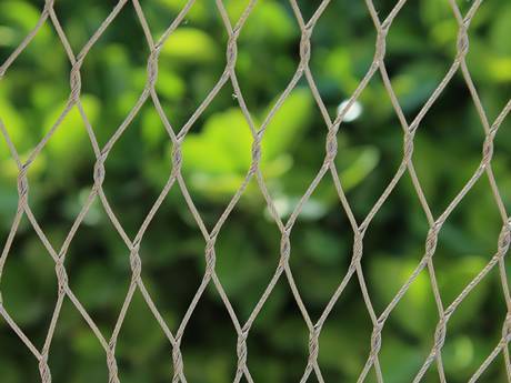 There is an interwoven wire rope mesh sheet.