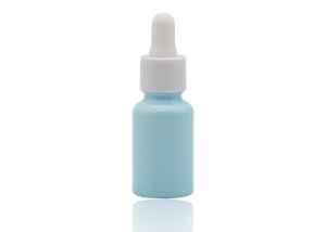 China Bluish Color Coating Essential Oil Dropper Bottles White Ceramic Bottle 30ml wholesale
