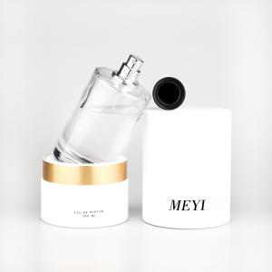 China 100ml Empty Perfume Bottle Round Clear Glass Spray Cosmetic wholesale