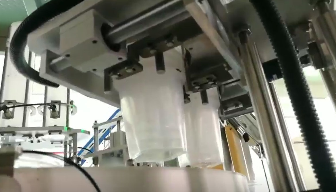 SS316 Automatic Filling Machine Chocolate Ball Weighing And Reloading Cup Code Detection System