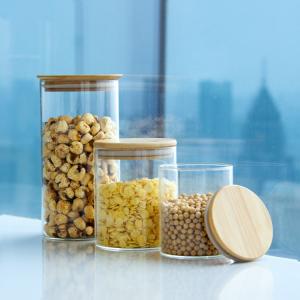 China Eco-friendly High Borosilicate Food Airtight Kitchen Glass Storage Jars With Bamboo Wooden Lids wholesale