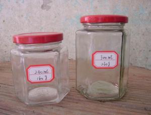 China 240ml 300ml hexagon glass jar for honey wholesale