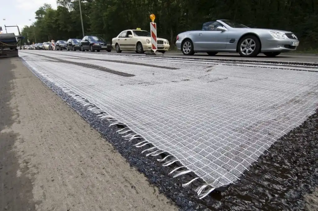 Composite Biaxial Fiberglass Geogrid with Nonwoven Geotextile for Soil Reinfocement/Road Construction Material Geocomposite Geogrid