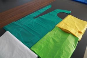 China Green / Blue / Yellow Disposable Plastic Aprons Embossed Surface Anti Bacterial wholesale