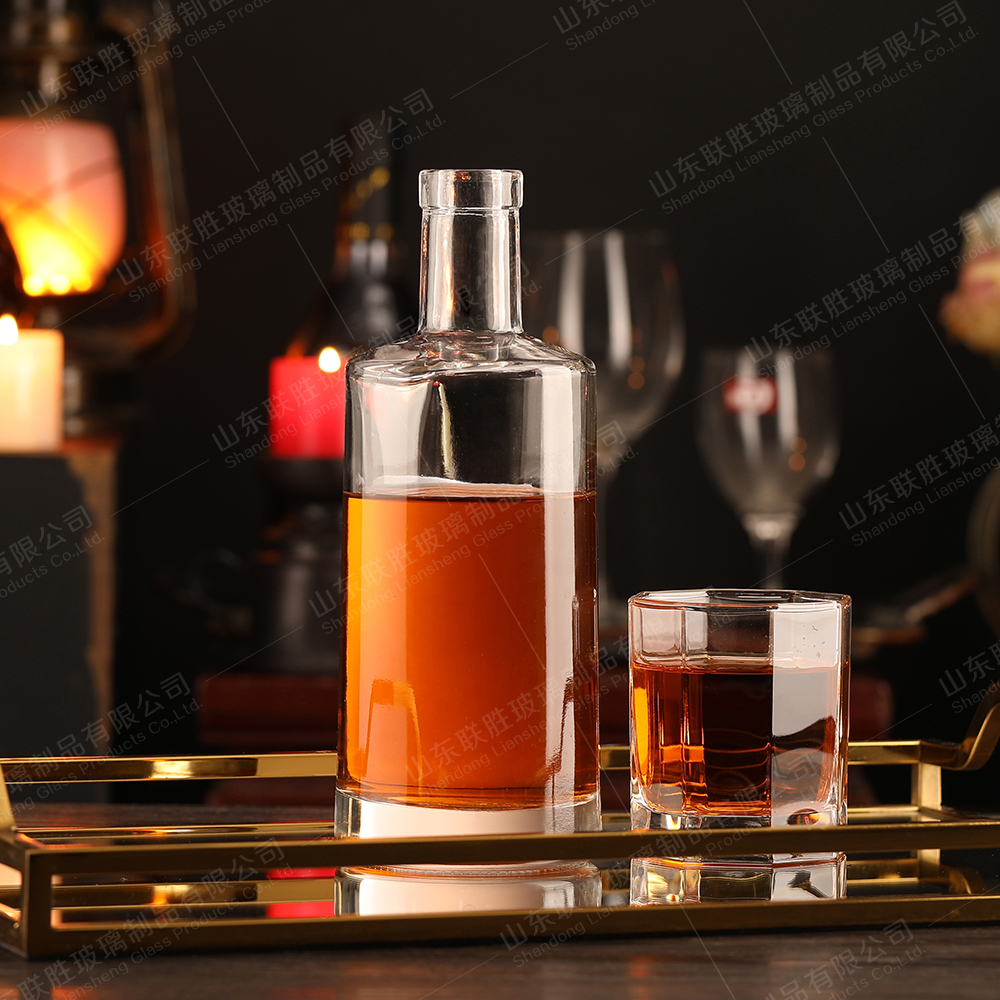 ODM 500ml 700ml 750ml Round Liquor Glass Bottle With T Sealing Cork