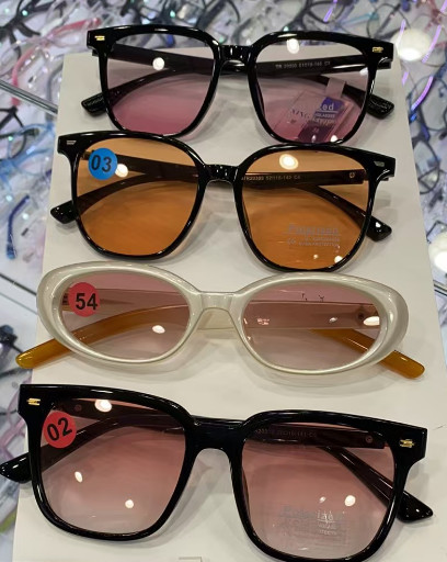 Fashionable trendy glasses paired with goggles for outdoor shopping wearing
