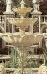 Sandstone fountain in garden