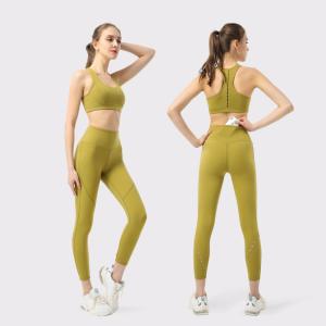 China Hollow Out Knot Yoga Set Clothes Big Hidden Back Pocket Yoga Leggings Set wholesale