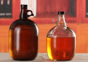 China Amber Glass Beer Growler 4L Capacity Large Beer Bottle Screw Top Lids wholesale
