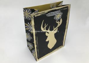 China Small / Large Xmas Gift Bags , Paper Christmas Goodie Bags Full Gold Hot Stamping Printed wholesale