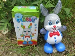 China New hot sale toy, electric lighting toy, can sing and dance, walking swing rabbit, flashlight toy wholesale