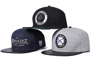 China Leather Brim 6 Panel Snapback Cap 58cm Embroidered Woven Label wholesale